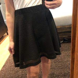 black mini flare skirt